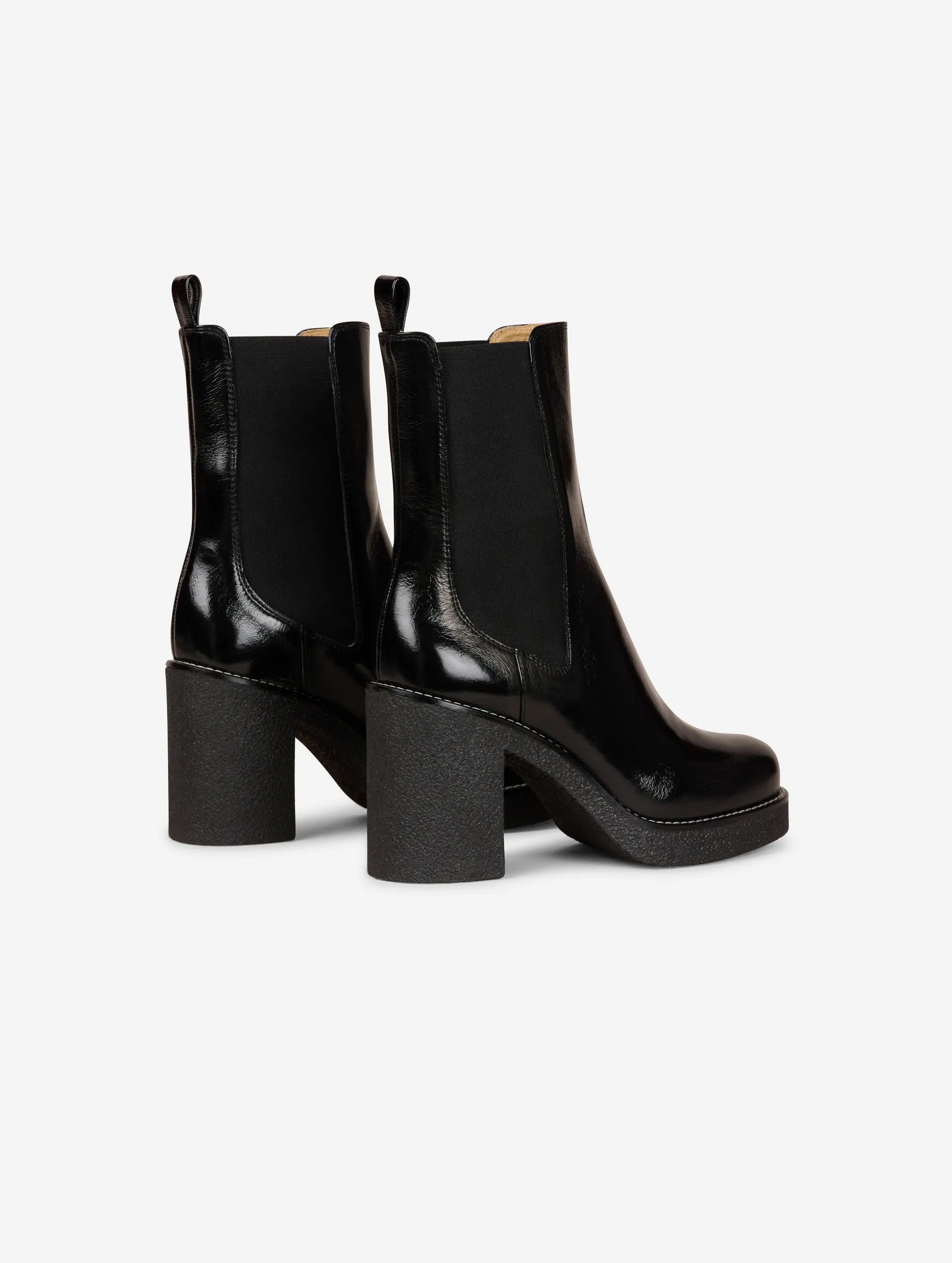 Elasticated black patent leather ankle boots